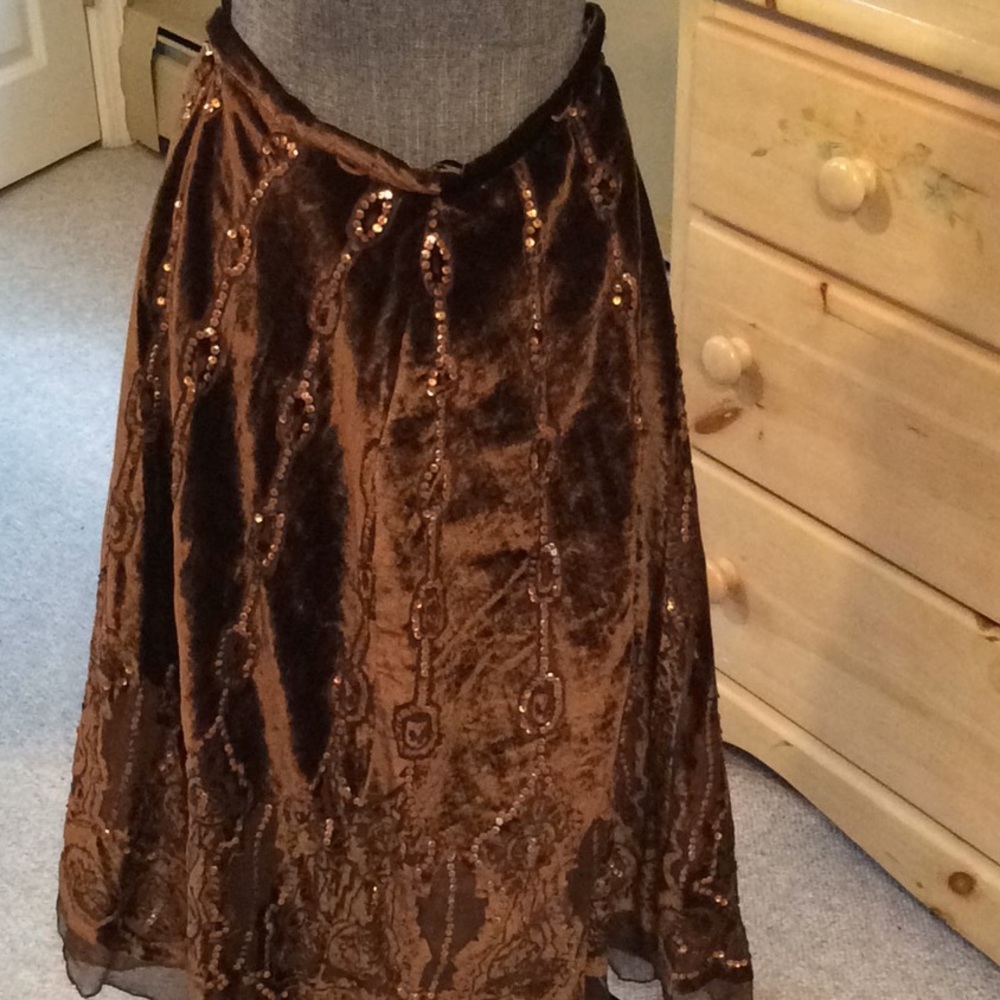 Brown velour with sequins skirt.